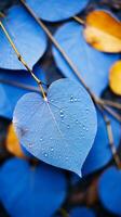 een blauw hart vormig blad met water druppels Aan het generatief ai foto