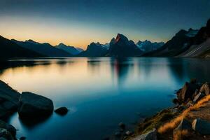 een meer en bergen Bij zonsondergang. ai-gegenereerd foto