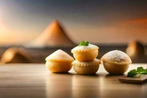 drie klein gebakjes zittend Aan een tafel met een berg in de achtergrond. ai-gegenereerd foto