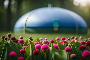 een blauw koepel in de midden- van een veld- van roze bloemen. ai-gegenereerd foto