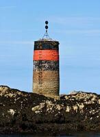 breton seinpaal en vuurtoren Aan brehat eiland foto