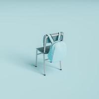 minimale stoel met hangende schooltas foto