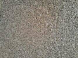 structuur van de zand Aan de oosten- Java strand foto