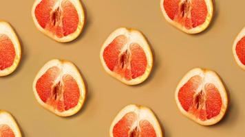 grapefruit patroon op gouden achtergrond. minimaal platliggend concept foto