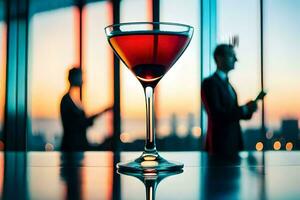 een martini glas met een rood vloeistof in het. ai-gegenereerd foto