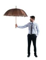 zakenman covers iets met een groot paraplu foto