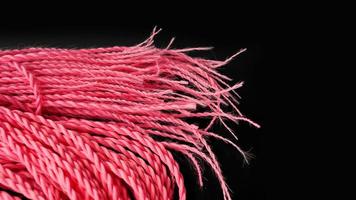 dubbele synthetische vlechten en roze dreadlocks foto
