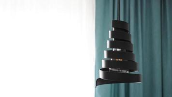 een moderne loft kroonluchter gemaakt van zwart metalen spiraal foto