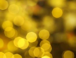 gouden abstracte bokeh cirkels. kerst feestelijke achtergrond foto