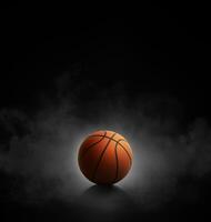 basketbal met Aan zwart achtergrond met rook foto