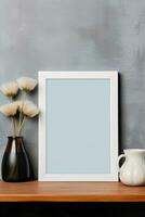 blanco verticaal afbeelding kader mockup hangende Aan een duidelijk muur met houten bureau tafel en bloem vaas ai gegenereerd foto