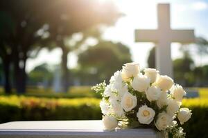 wit bloemen in voorkant van een grafsteen Bij een begraafplaats met zonsondergang.begrafenis concept ai gegenereerd foto