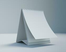 bureau kalender met wit papier geschikt voor kalender ontwerp presentatie foto