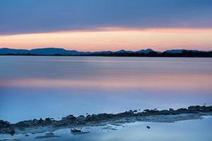 zonsondergang bij de estany pudent in het natuurpark ses salines foto