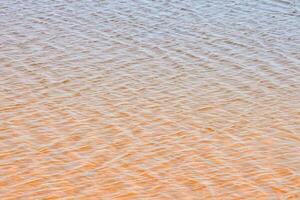 oranje en bruin water structuur foto