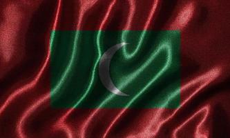 behang met de vlag van de Malediven en de wapperende vlag per stof.