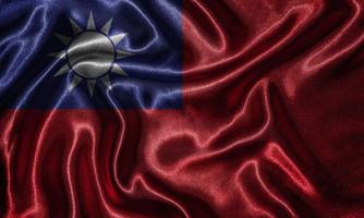 behang door de vlag van taiwan en wapperende vlag door stof. foto