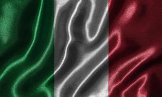 behang door de vlag van italië en wapperende vlag door stof. foto