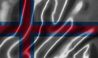 behang met vlag van de Faeröer en wapperende vlag per stof. foto