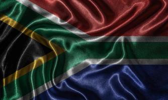behang met vlag van Zuid-Afrika en wapperende vlag per stof. foto