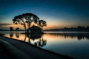 een klein huis zit Aan de kust van een meer Bij zonsondergang. ai-gegenereerd foto