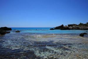 kedrodasos strand kreta eiland blauwe lagune camping kust kristalhelder water foto