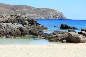 kedrodasos strand kreta eiland griekenland blauwe lagune kristalwater koralen foto