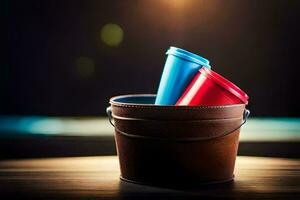 twee rood en blauw plastic cups in een emmer. ai-gegenereerd foto