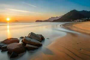 de zon sets over- de strand en rotsen. ai-gegenereerd foto