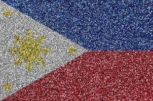 Filippijnen vlag afgebeeld Aan veel klein glimmend pailletten. kleurrijk festival achtergrond voor partij foto