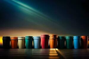 een rij van kleurrijk cups Aan een donker achtergrond. ai-gegenereerd foto
