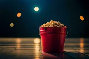 een rood emmer gevulde met popcorn Aan een houten vloer. ai-gegenereerd foto