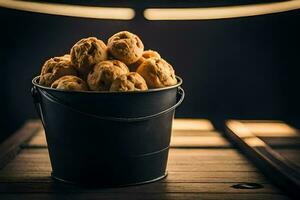 een emmer gevulde met koekjes Aan een houten tafel. ai-gegenereerd foto