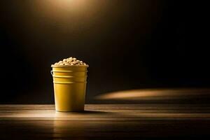 een emmer van popcorn Aan een tafel in voorkant van een licht. ai-gegenereerd foto