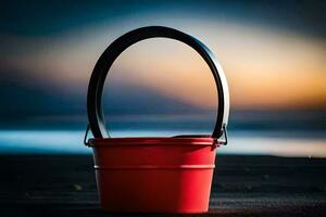 een rood emmer zittend Aan de strand Bij zonsondergang. ai-gegenereerd foto
