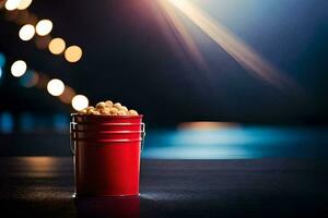 een rood emmer met popcorn Aan een tafel in voorkant van een wazig achtergrond. ai-gegenereerd foto