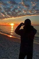 zonsondergang zee fotograaf foto