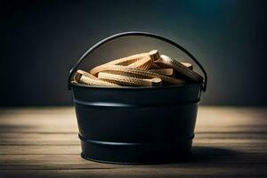 een emmer gevulde met houten stokjes Aan een houten tafel. ai-gegenereerd foto