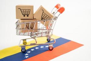 doos met winkelwagenlogo en vlag van venezuela