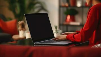 vrouw in rood met een laptop. een meisje koopt Kerstmis cadeaus in een online op te slaan ai generatief foto