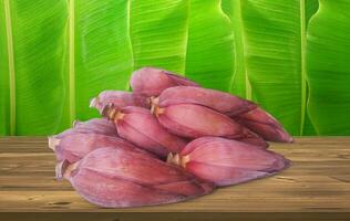 banaan bloemen Aan een houten tafel banaan blad achtergrond foto