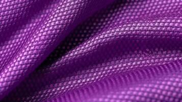 Purper voetbal kleding stof structuur met lucht gaas. sportkleding achtergrond foto