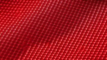 rood Amerikaans voetbal Jersey met lucht maas textuur. atletisch slijtage backdrop foto