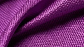 Purper voetbal kleding stof structuur met lucht gaas. sportkleding achtergrond foto