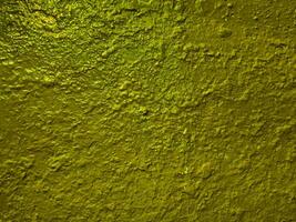 oppervlakte grungy van beton muur met helder kleur getextureerde effectc van zand en cement materialen. foto