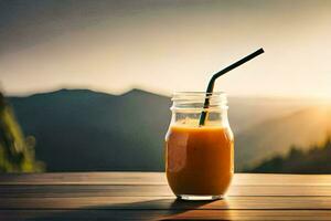 een glas van oranje sap Aan een tafel met bergen in de achtergrond. ai-gegenereerd foto