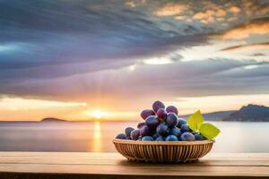 druiven in een mand Aan een houten tafel met een zonsondergang in de achtergrond. ai-gegenereerd foto