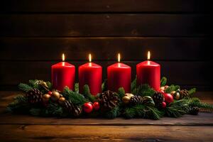 vier rood brandend kaarsen voor Duitse komst seizoen. Kerstmis krans decoratie Aan donker houten achtergrond. foto