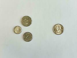 ons kwartaal dollar munt vs een, twee en vijf sikkel munten foto