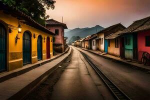 een straat in Colombia met kleurrijk huizen en een trein spoor. ai-gegenereerd foto